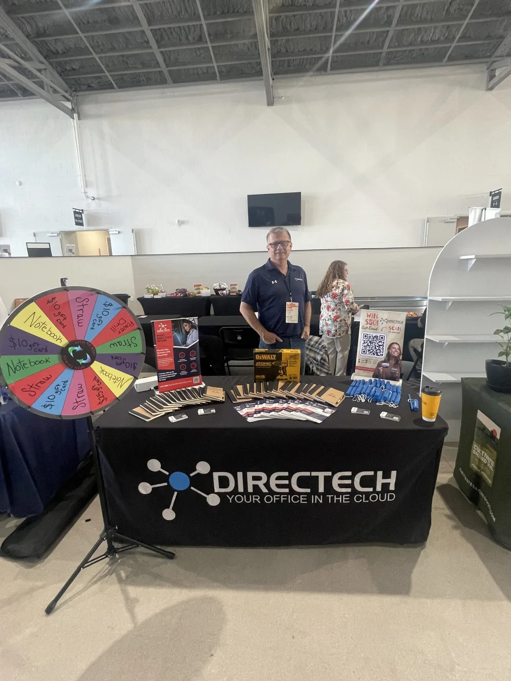 Frank Amato at the DirecTech booth at a business expo